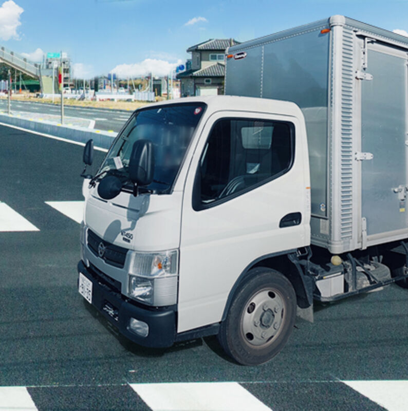 道路と車の合成イメージ